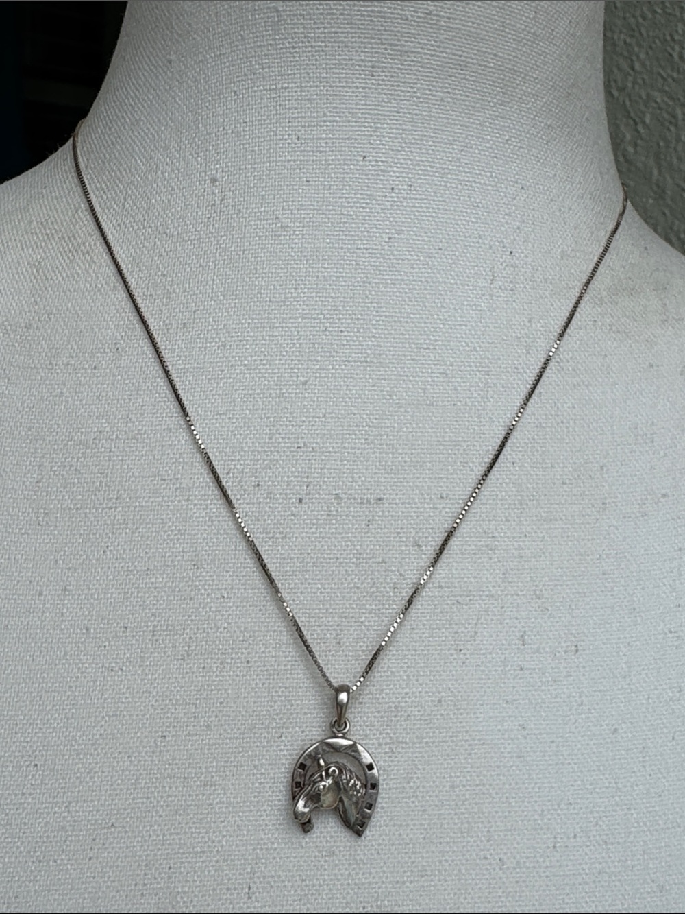 Vintage 925 Sterling Silver horse in horseshoe pendant and chain.